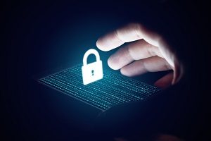 Hand Above Passcode Locked Phone