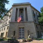 DOJ Headquarters building seen from low angle