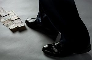 person following a trail of money