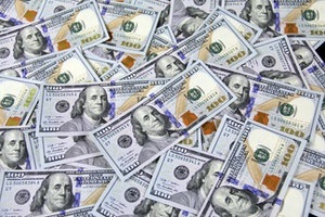 hundred dollar bills scattered around