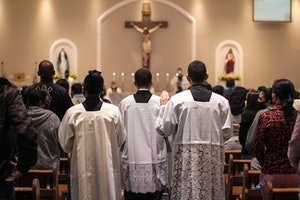 People standing inside church