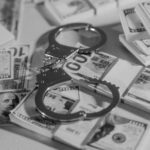 handcuff and money