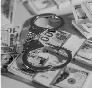 handcuff and money
