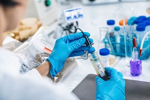 Laboratory Analysis. Scientist Measuring Sample